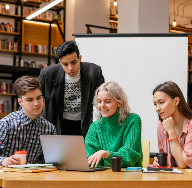 Students reviewing study abroad plans together